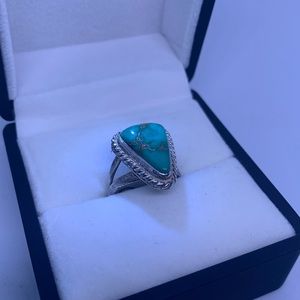 Sz 5 turquoise ring stamped “925” signed “RA”